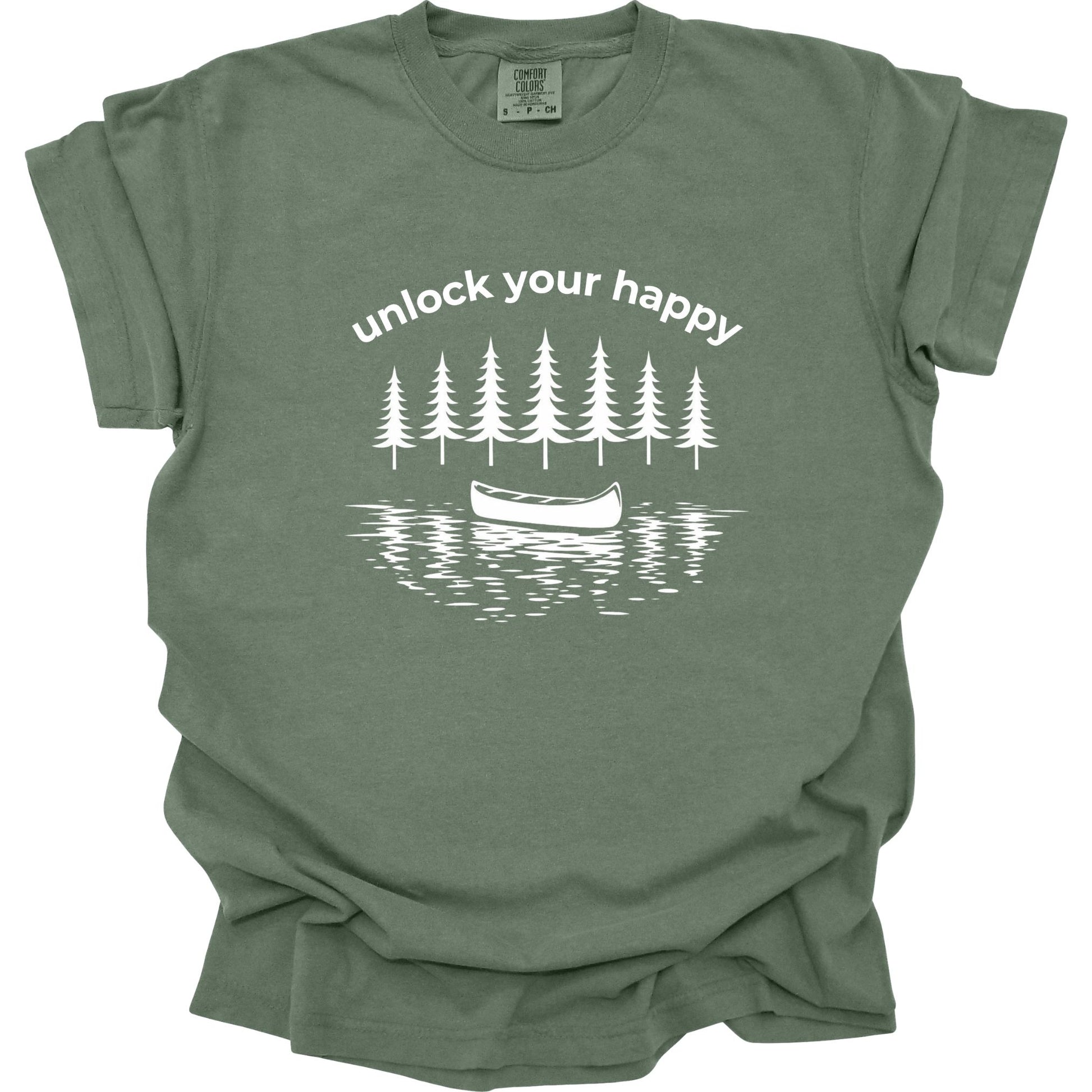 Sage t-shirt with a graphic design of trees and a canoe with 'unlock your happy' text on a white background.