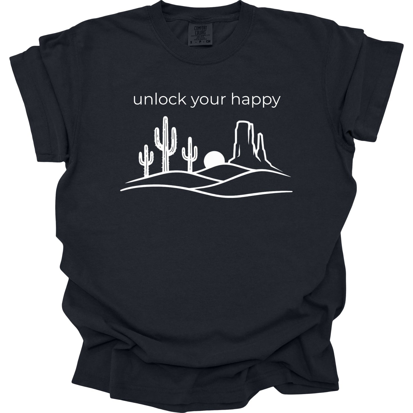 Black t-shirt with white desert landscape graphic and 'unlock your happy' text on a white background