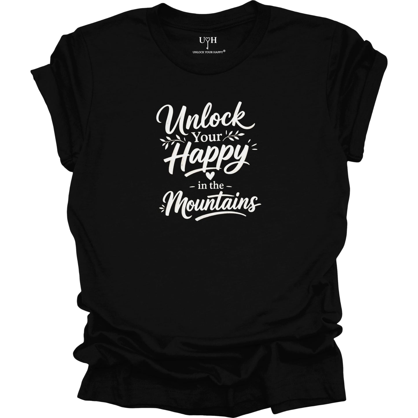 Black t-shirt with white text 'Unlock Your Happy in the Mountains' on a white background