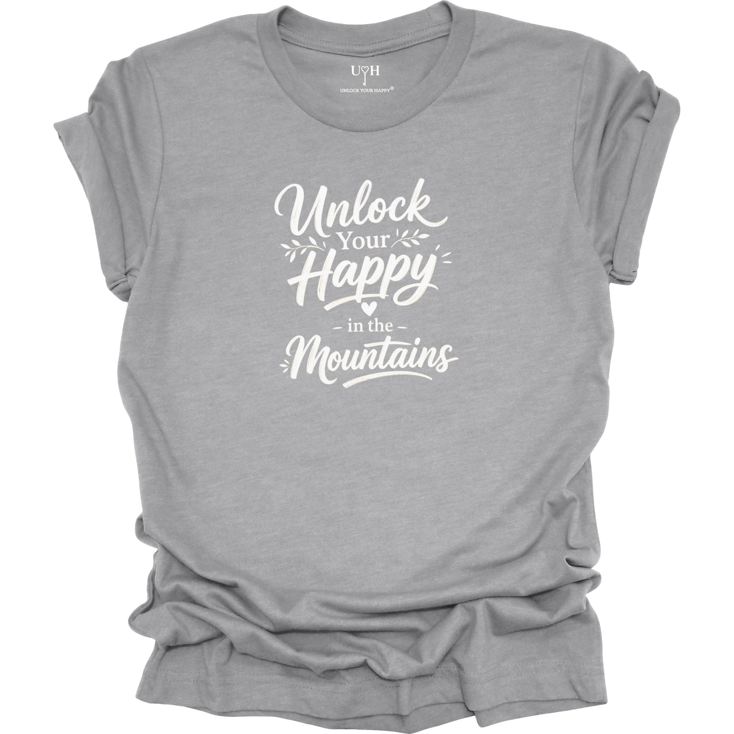Gray t-shirt with mountain design and text 'I Heal in the Mountains' on a white background