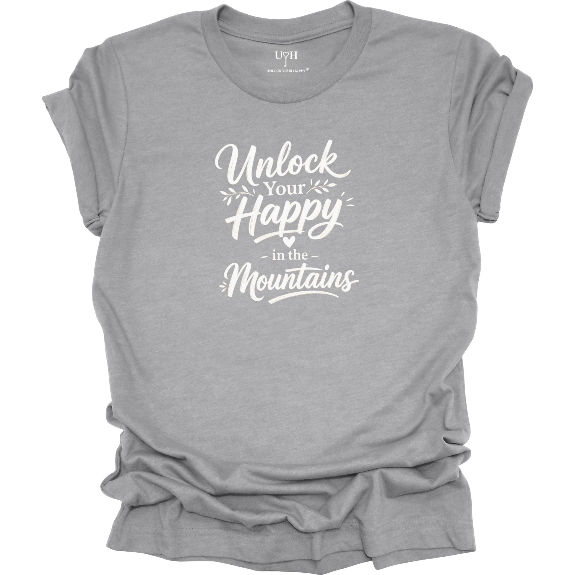 Gray t-shirt with mountain design and text 'I Heal in the Mountains' on a white background
