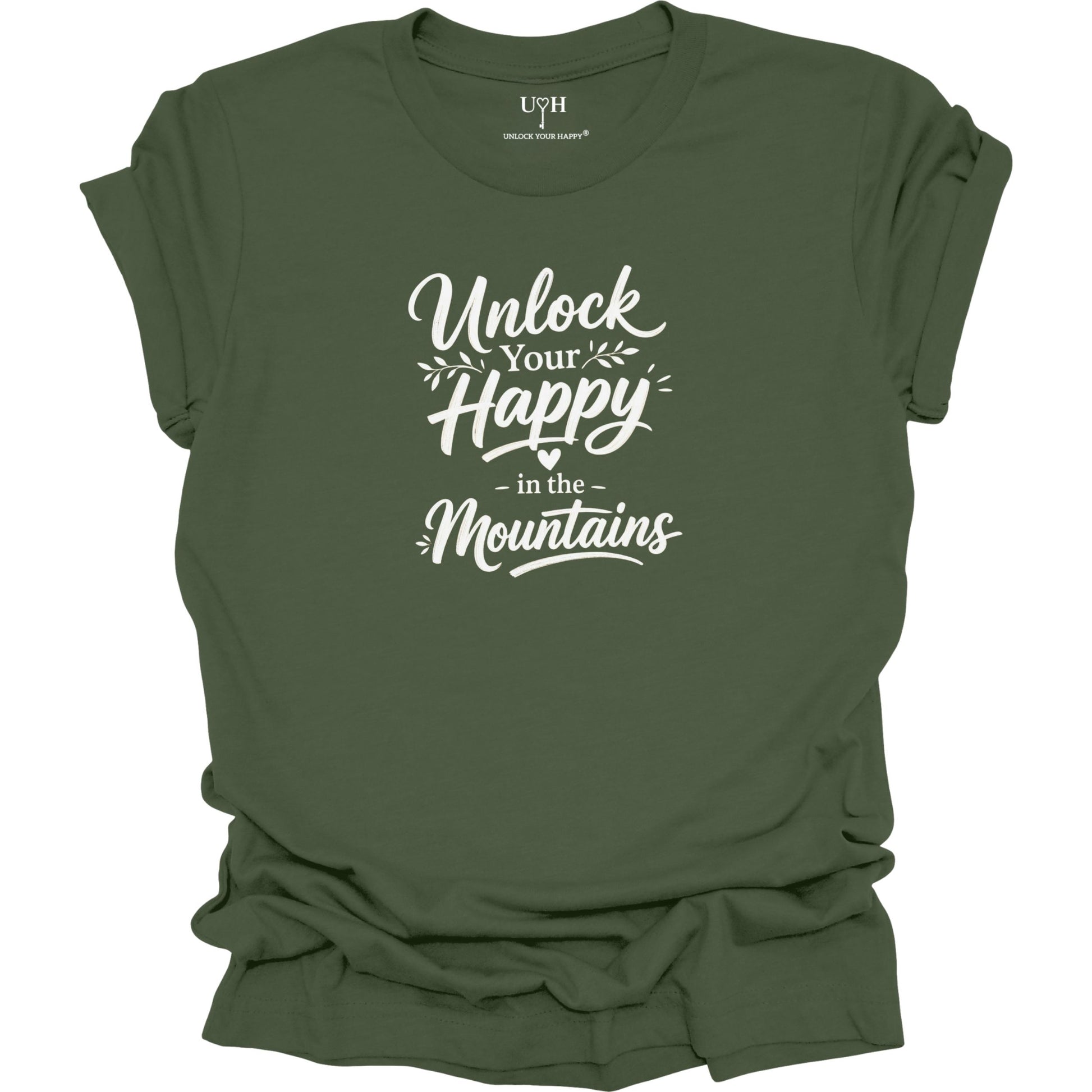 Green t-shirt with 'Unlock Your Happy in the Mountains' text on a white background