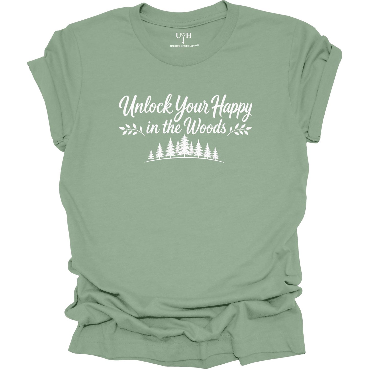 Unlock Your Happy in the Woods White Text with tree line on a sage-green shirt