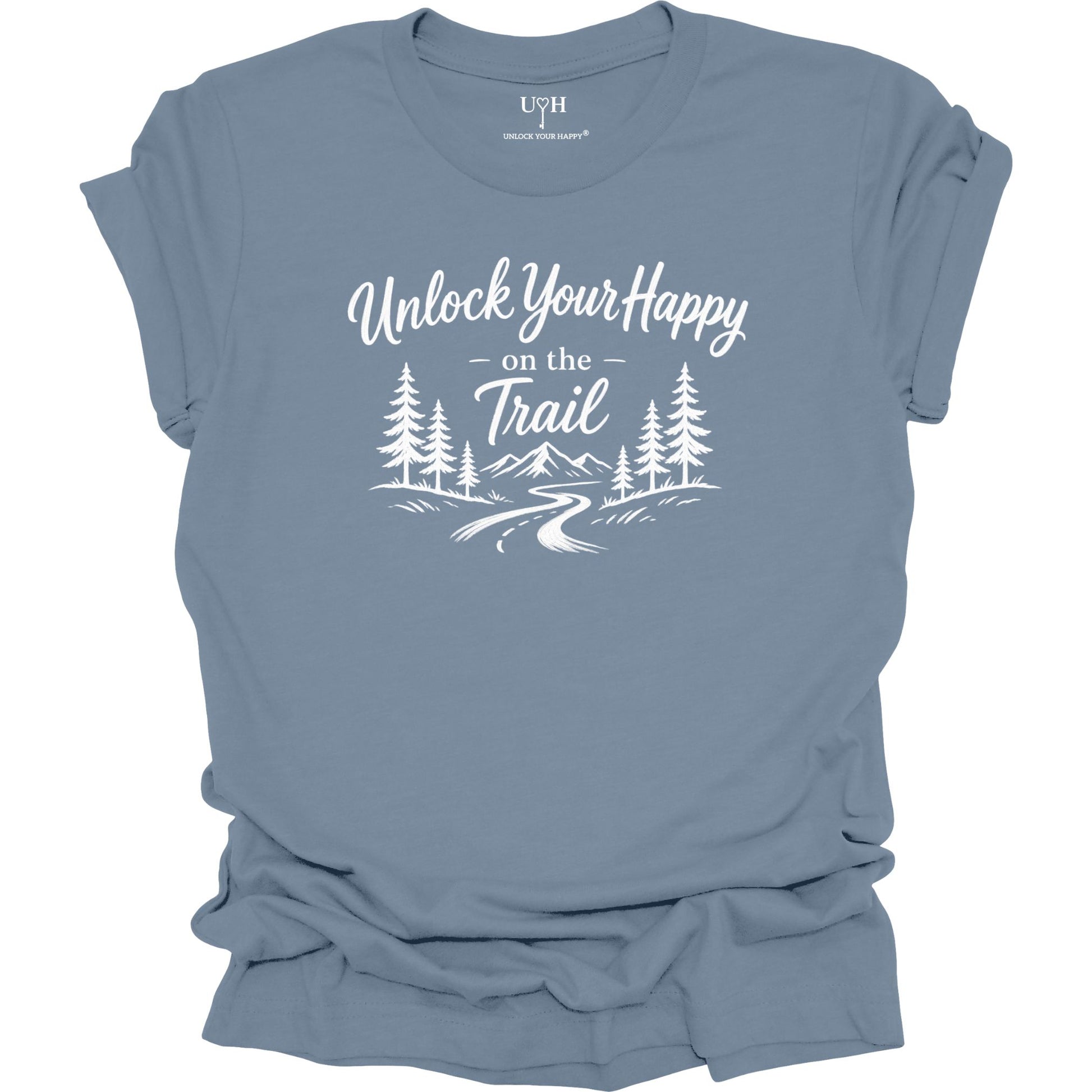 A slate blue short-sleeve t-shirt with a white graphic print on the front that reads 'Unlock Your Happy on the Trail' above a simple pine tree and mountain landscape illustration. The shirt is shown flat against a solid white background, with the collar label showing the brand 'UYH'.