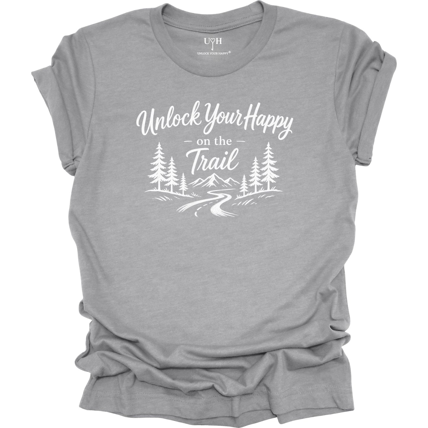 A heather gray short-sleeve t-shirt with a white graphic print that reads 'Unlock Your Happy on the Trail' above a simple forest and trail illustration. The shirt is shown flat against a plain white background, with the collar label showing the brand 'UYH'.