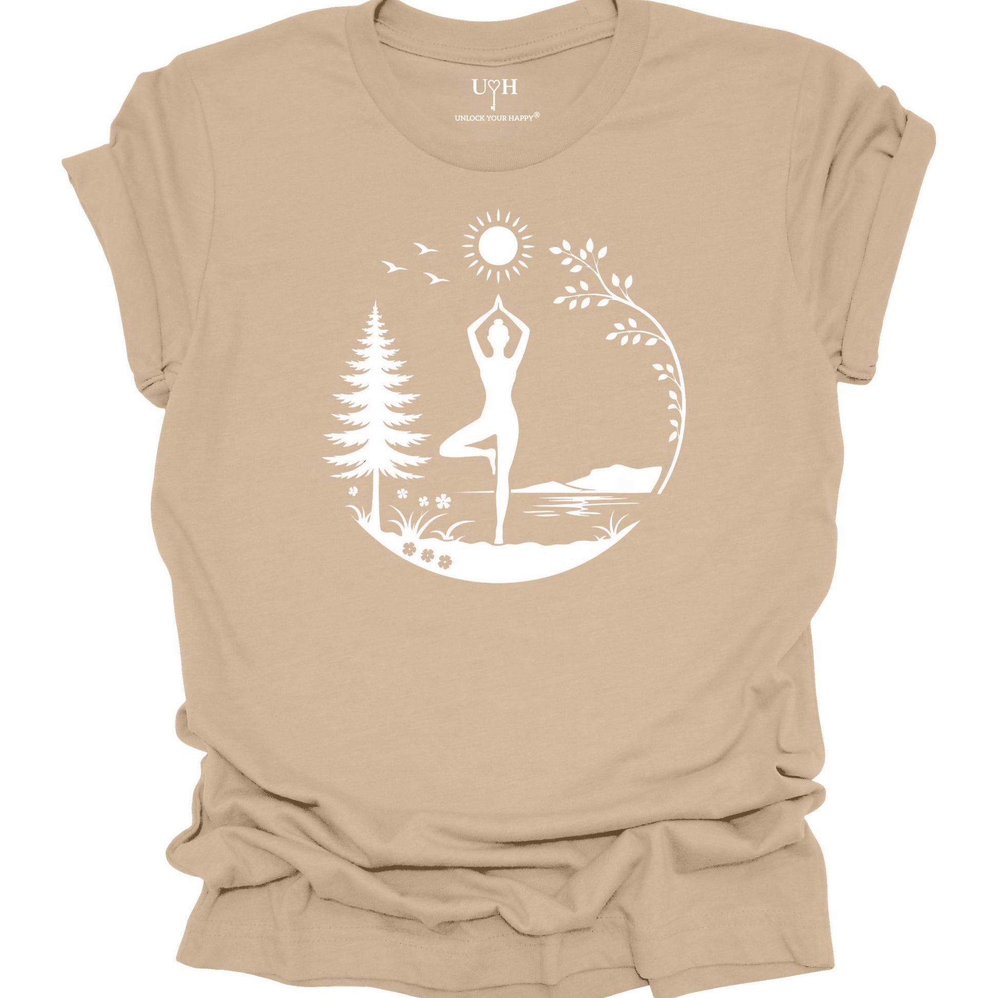 Nature yoga tan tee with tree pose, minimalist mountains, trees & sun design, soft unisex shirt with “Unlock Your Happy” sleeve detail